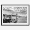 Golden Gate Bridge Wall Art in black-and-white HDR photography with dramatic clouds and water reflections.