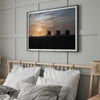 Step into Venice Beach with our fine art beach sunset framed or unframed print. The print showcases the beach in sunset with the silhouettes of the famous lifeguard towers and people in the sunset.