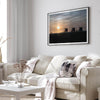 Step into Venice Beach with our fine art beach sunset framed or unframed print. The print showcases the beach in sunset with the silhouettes of the famous lifeguard towers and people in the sunset.