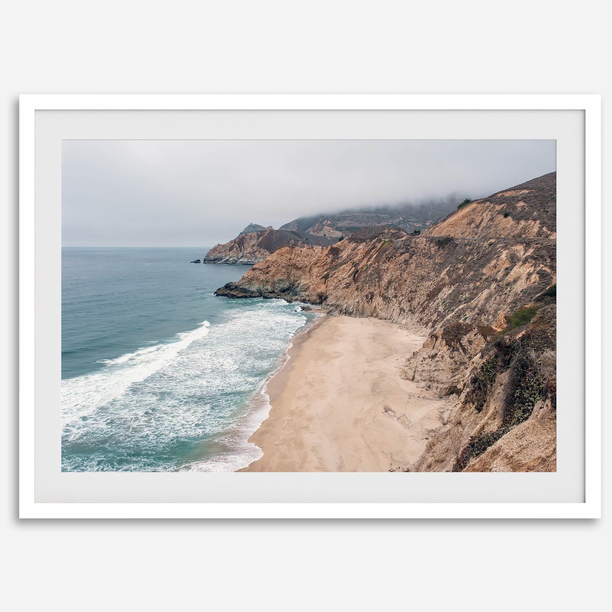 California beach wall art featuring Gray Whale Cove Beach with sandy shores, rugged cliffs, and misty Pacific Ocean waves.
