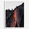 This premium photography framed or unframed fine poster print of Yosemite National Park Firefall - a rare phenomenon where Horsetail Falls in Yosemite seems to be flowing with fire rather than water.