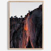 This premium photography framed or unframed fine poster print of Yosemite National Park Firefall - a rare phenomenon where Horsetail Falls in Yosemite seems to be flowing with fire rather than water.
