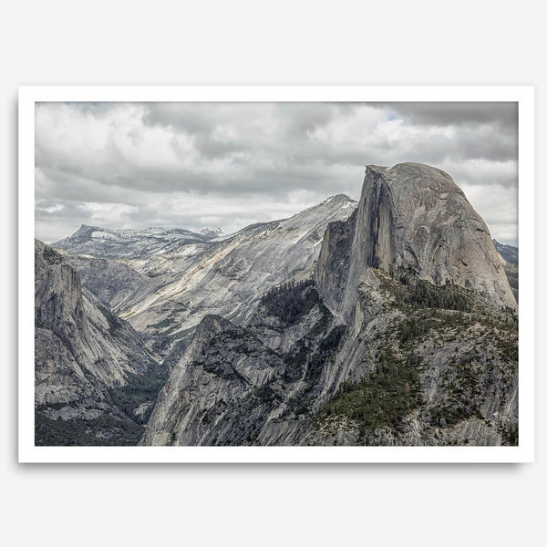 A fine art framed or unframed print showcasing the stunning half-dome mountain in Yosemite national park. The picture was shot an edited as an HDR photograph adding more depth to this beautiful mountain wall art.