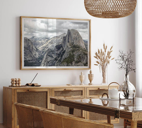 A fine art framed or unframed print showcasing the stunning half-dome mountain in Yosemite national park. The picture was shot an edited as an HDR photograph adding more depth to this beautiful mountain wall art.