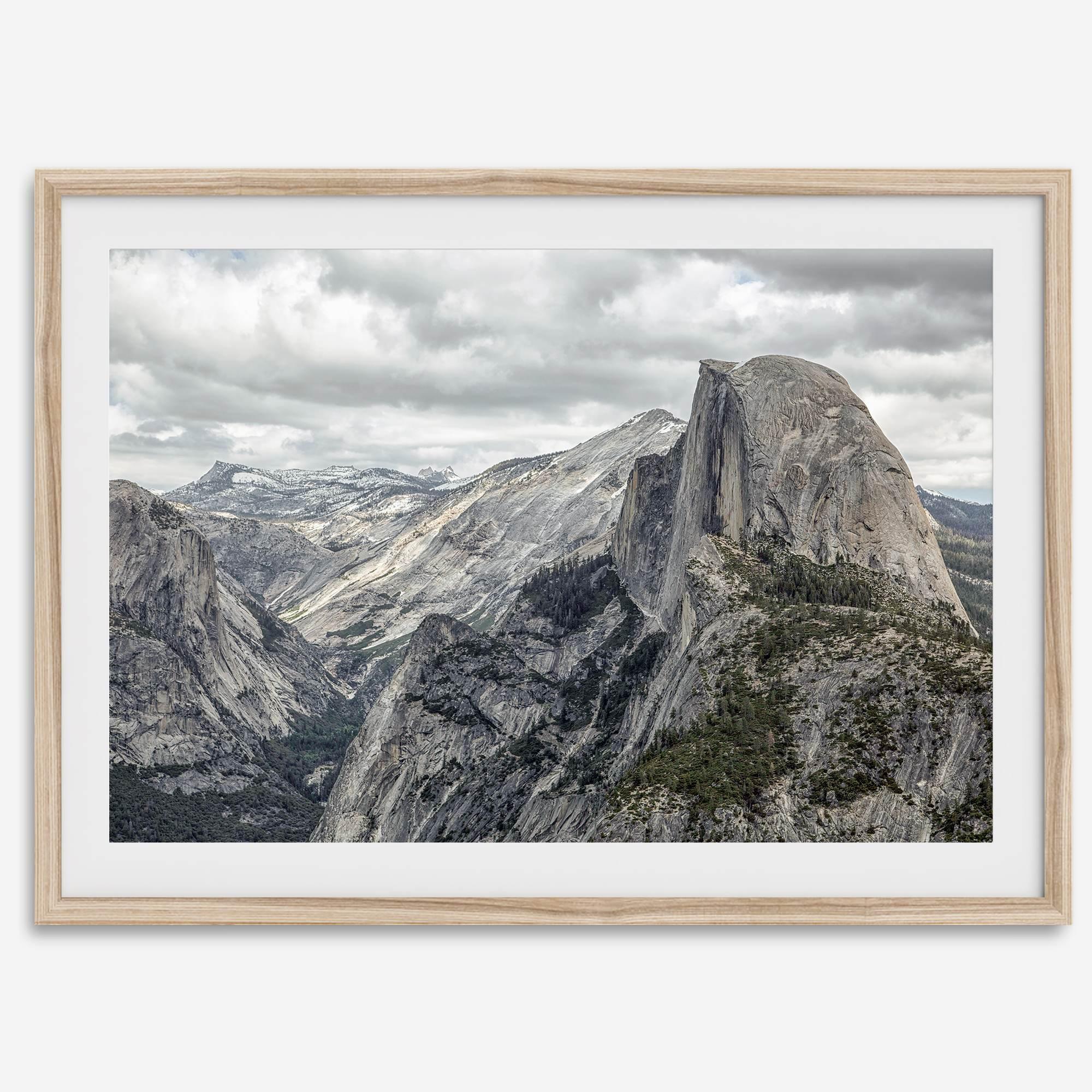 A fine art framed or unframed print showcasing the stunning half-dome mountain in Yosemite national park. The picture was shot an edited as an HDR photograph adding more depth to this beautiful mountain wall art.