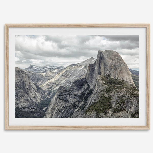 A fine art framed or unframed print showcasing the stunning half-dome mountain in Yosemite national park. The picture was shot an edited as an HDR photograph adding more depth to this beautiful mountain wall art.