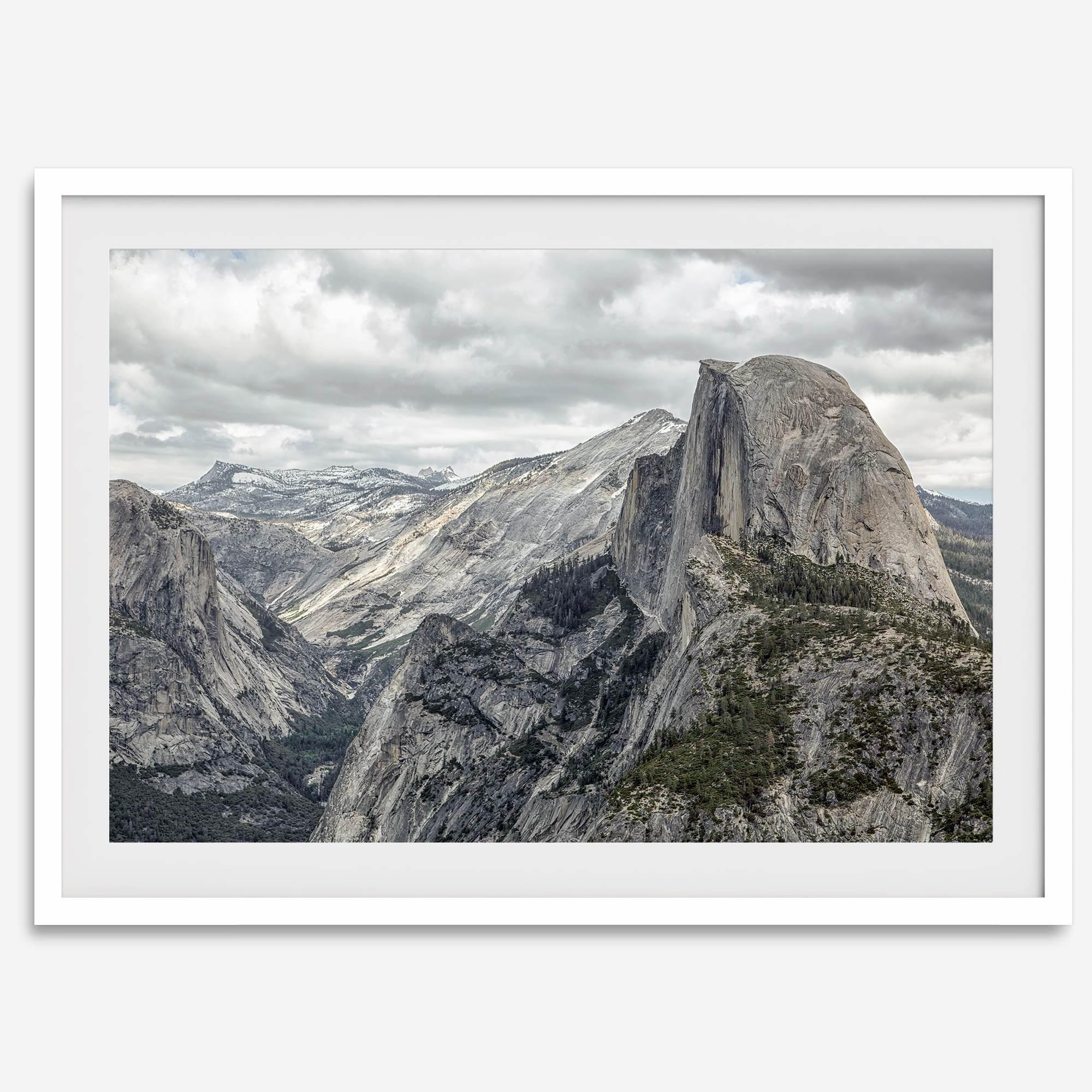 A fine art framed or unframed print showcasing the stunning half-dome mountain in Yosemite national park. The picture was shot an edited as an HDR photograph adding more depth to this beautiful mountain wall art.
