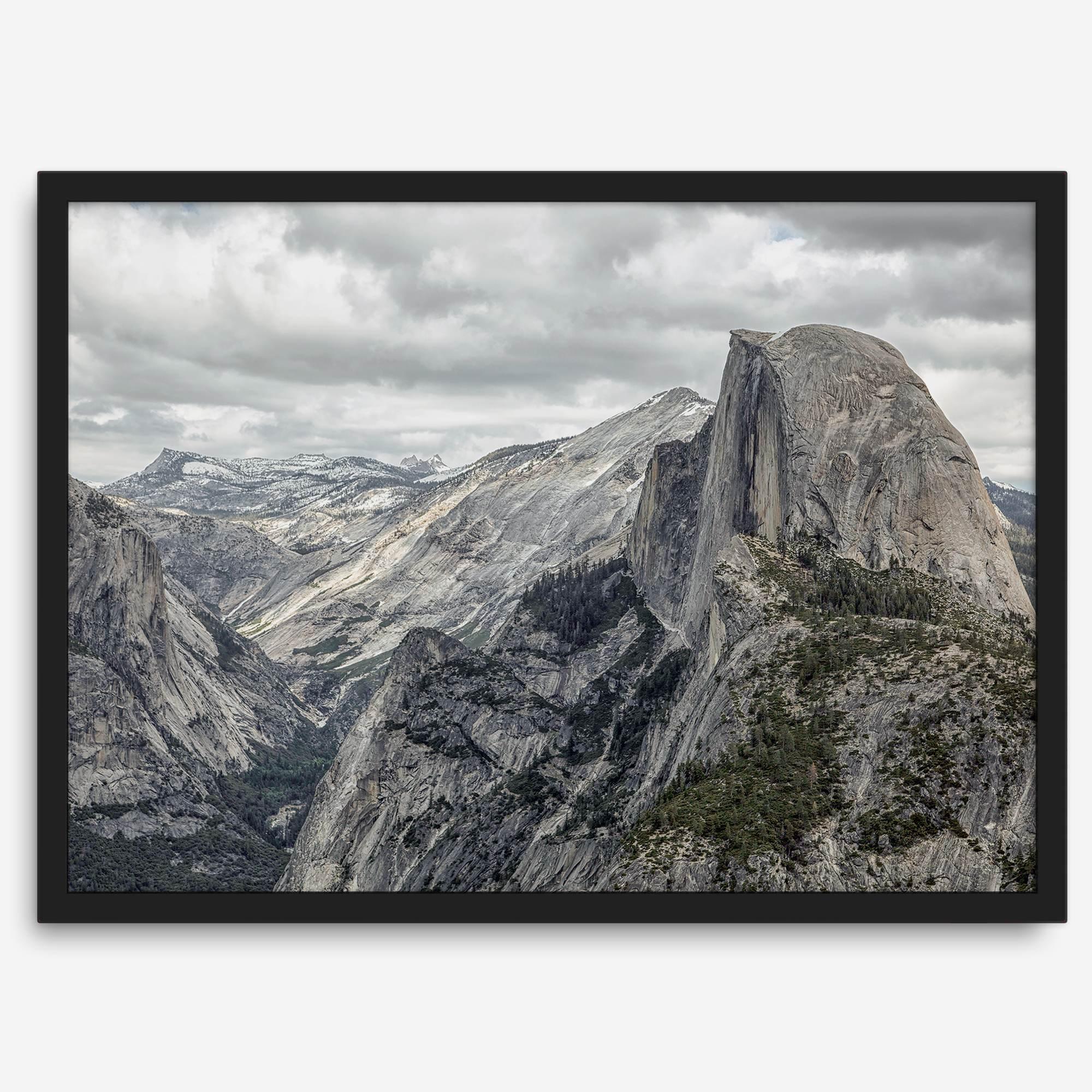 A fine art framed or unframed print showcasing the stunning half-dome mountain in Yosemite national park. The picture was shot an edited as an HDR photograph adding more depth to this beautiful mountain wall art.