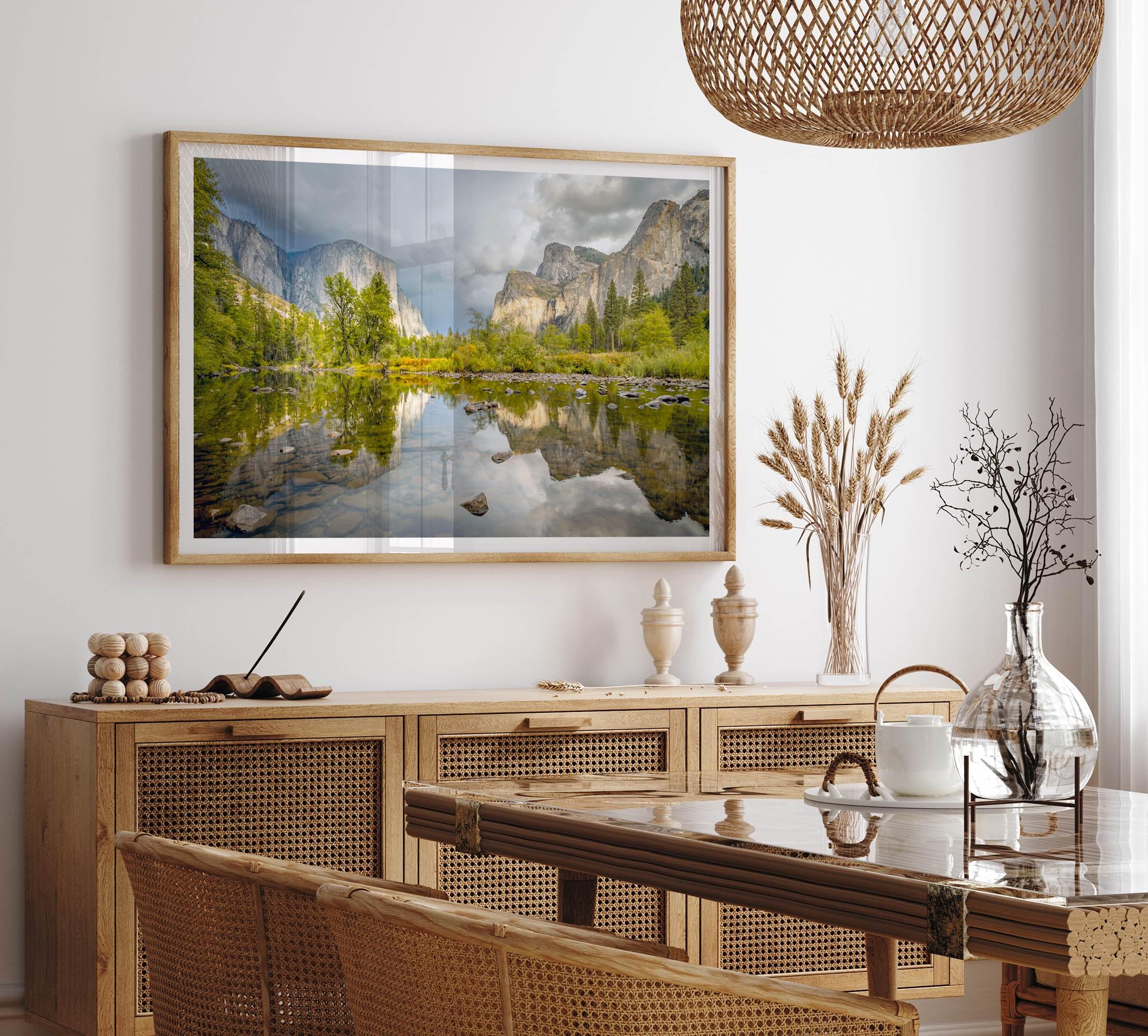 A stunning framed large Yosemite National Park print that shows the breathtaking valley at sunset with its mountains, rivers, forests, and waterfalls. A truly mesmerizing landscape that is as perfect as your wall decor as it is a special gift.