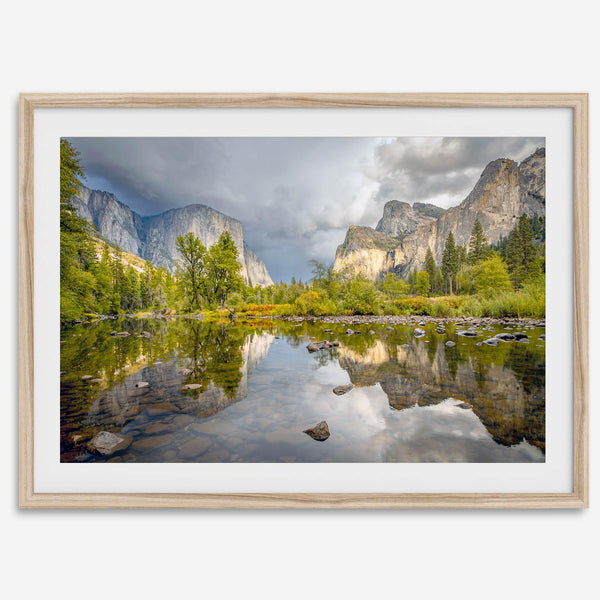 A stunning framed large Yosemite National Park print that shows the breathtaking valley at sunset with its mountains, rivers, forests, and waterfalls. A truly mesmerizing landscape that is as perfect as your wall decor as it is a special gift.