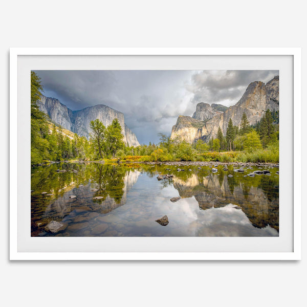 A stunning framed large Yosemite National Park print that shows the breathtaking valley at sunset with its mountains, rivers, forests, and waterfalls. A truly mesmerizing landscape that is as perfect as your wall decor as it is a special gift.