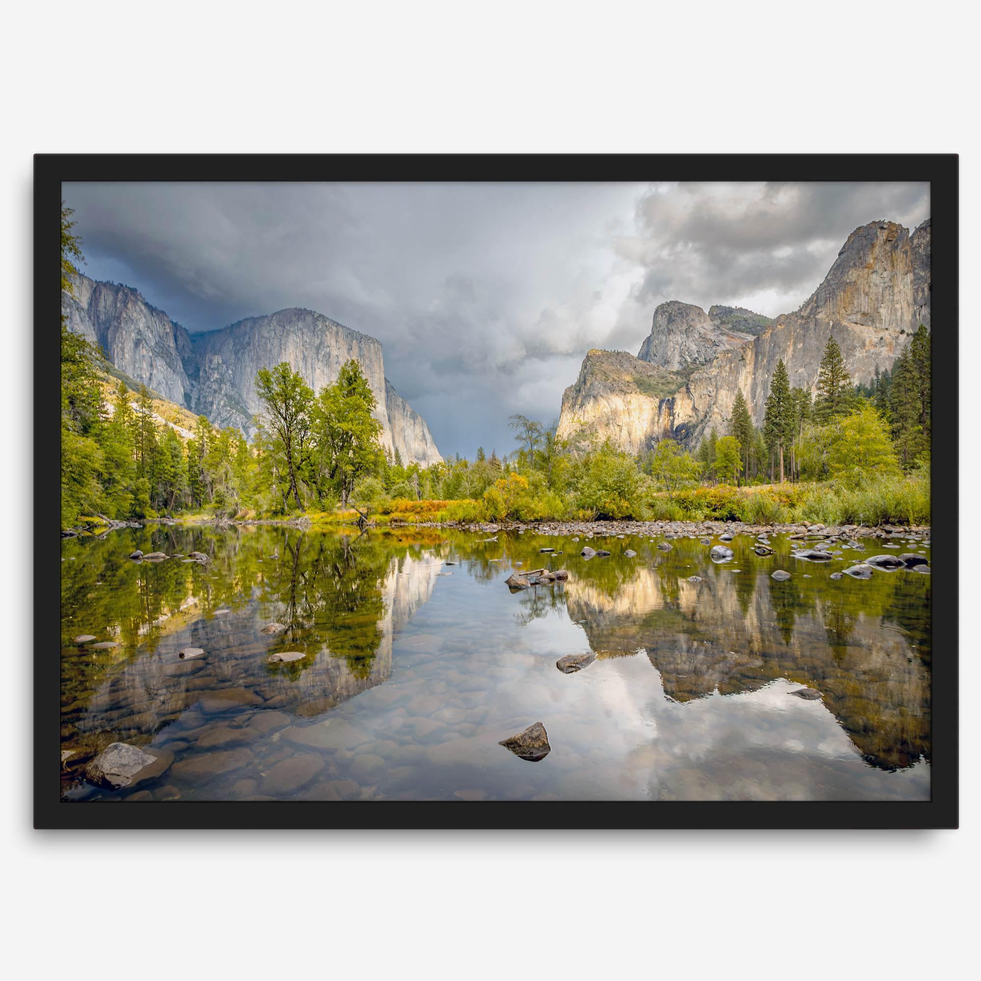 A stunning framed large Yosemite National Park print that shows the breathtaking valley at sunset with its mountains, rivers, forests, and waterfalls. A truly mesmerizing landscape that is as perfect as your wall decor as it is a special gift.