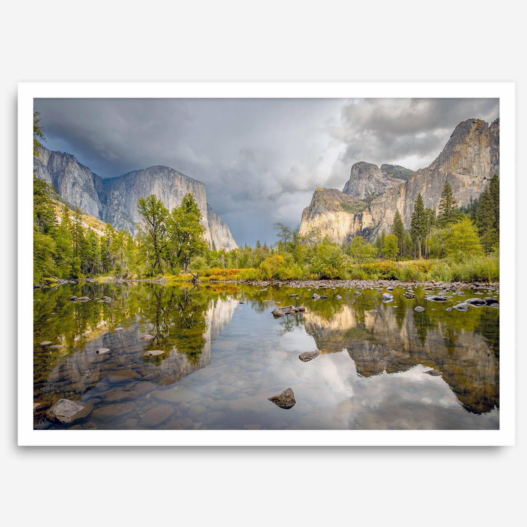 A stunning framed large Yosemite National Park print that shows the breathtaking valley at sunset with its mountains, rivers, forests, and waterfalls. A truly mesmerizing landscape that is as perfect as your wall decor as it is a special gift.
