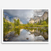 A stunning framed large Yosemite National Park print that shows the breathtaking valley at sunset with its mountains, rivers, forests, and waterfalls. A truly mesmerizing landscape that is as perfect as your wall decor as it is a special gift.