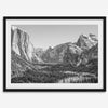 A fine art Yosemite Print featuring Yosemite Valley covered in snow in winter and a beautiful fog lays in the valley forest. This black and white mountain wall art is perfect for nature and fine art lovers.