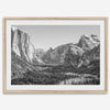 A fine art Yosemite Print featuring Yosemite Valley covered in snow in winter and a beautiful fog lays in the valley forest. This black and white mountain wall art is perfect for nature and fine art lovers.