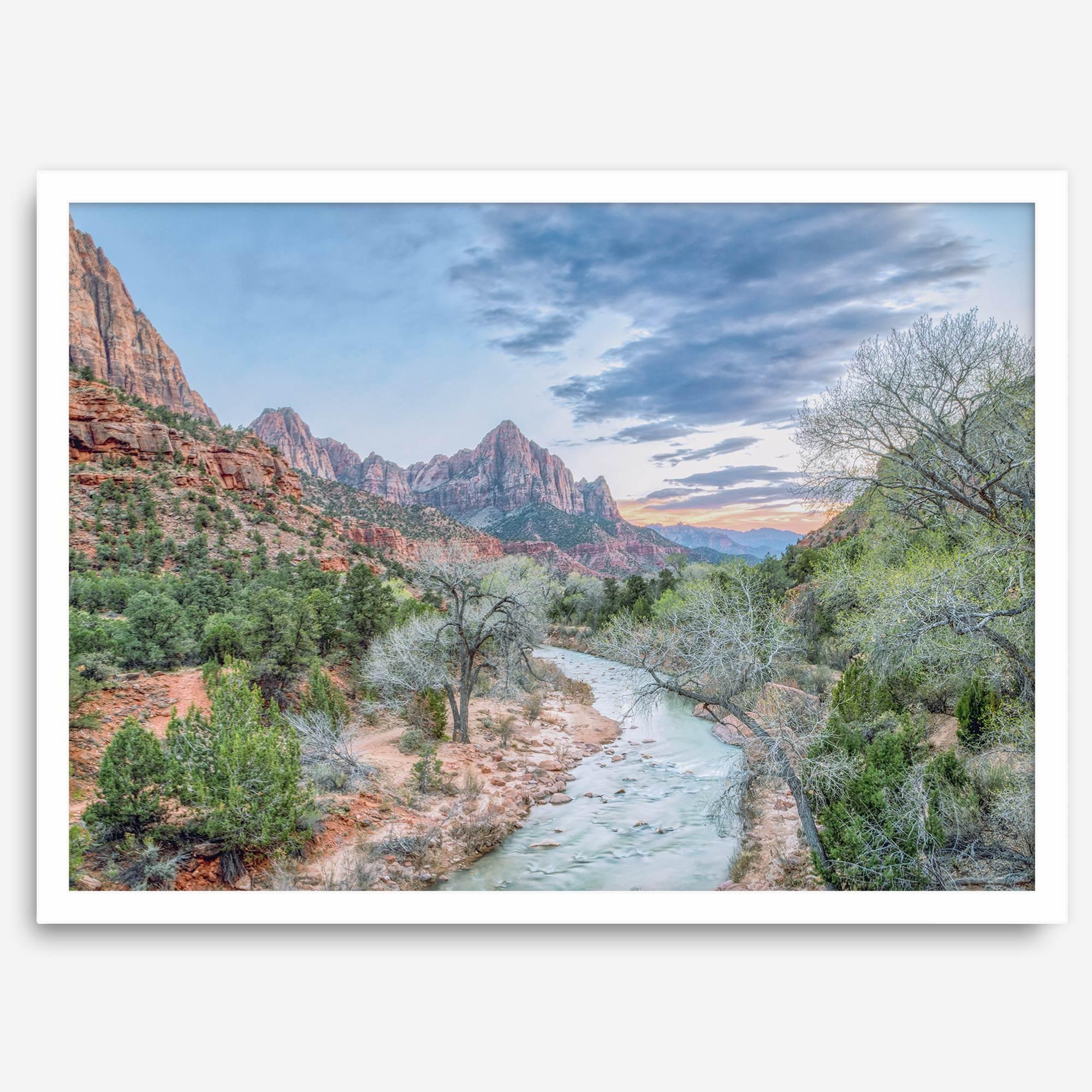 A framed fine art landscape photography print of Zion National Park showing a beautiful river, trees, and desert landscape with the backdrop of Zion mountain range. This Utah wall art is perfect for nature photography and desert art enthusiasts.