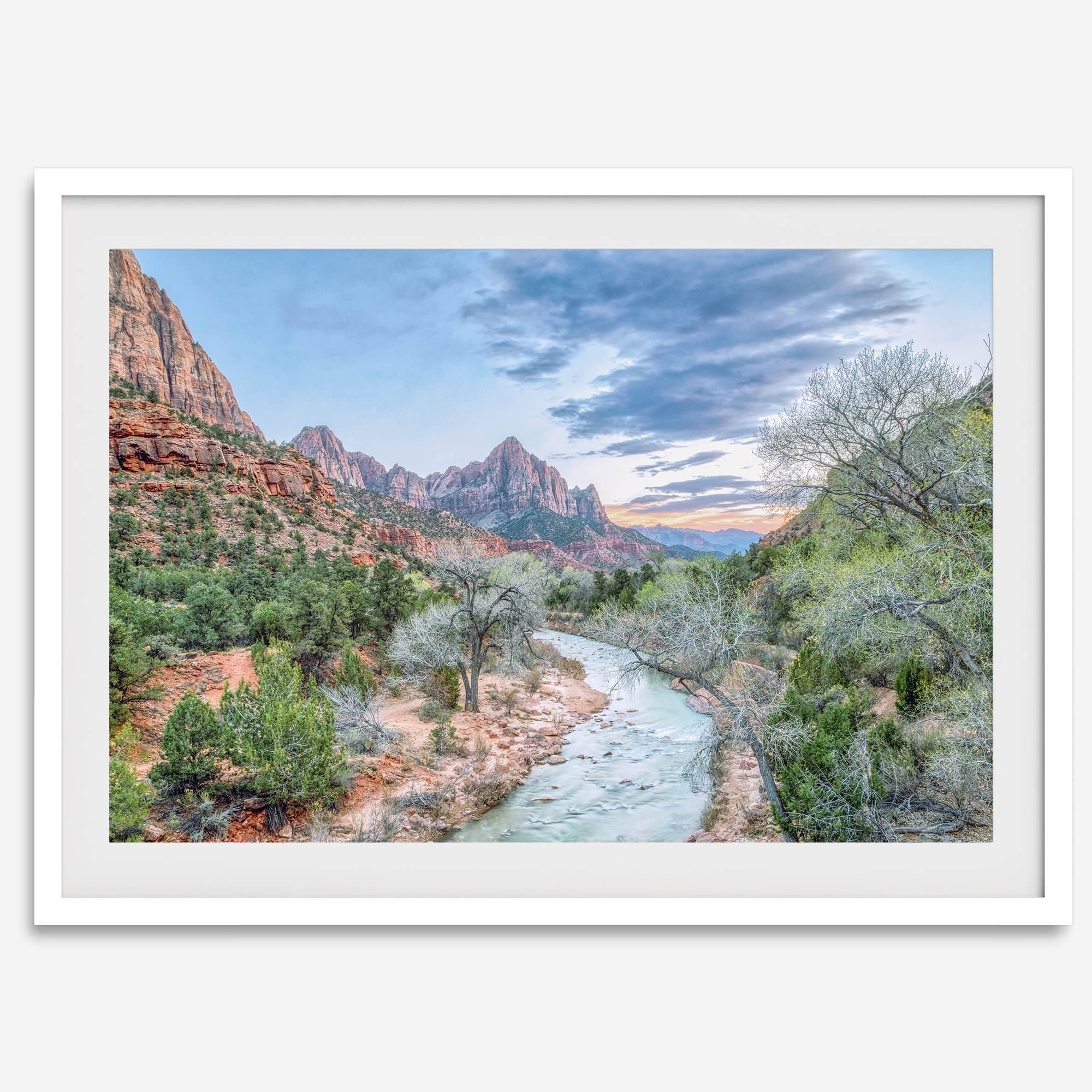 A framed fine art landscape photography print of Zion National Park showing a beautiful river, trees, and desert landscape with the backdrop of Zion mountain range. This Utah wall art is perfect for nature photography and desert art enthusiasts.