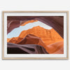 Framed fine art print of Antelope Canyon in Arizona, showcasing layered desert rock formations with rich colors and smooth textures.
