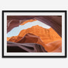 Framed fine art print of Antelope Canyon in Arizona, showcasing layered desert rock formations with rich colors and smooth textures.