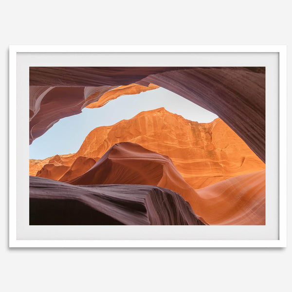 Framed fine art print of Antelope Canyon in Arizona, showcasing layered desert rock formations with rich colors and smooth textures.