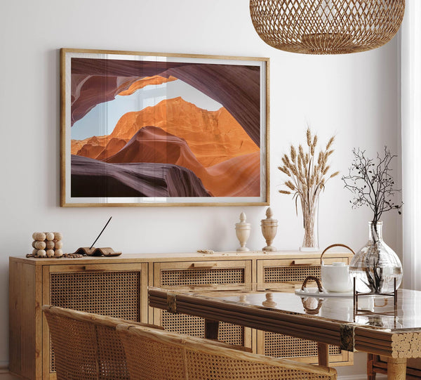 Framed fine art print of Antelope Canyon in Arizona, showcasing layered desert rock formations with rich colors and smooth textures.