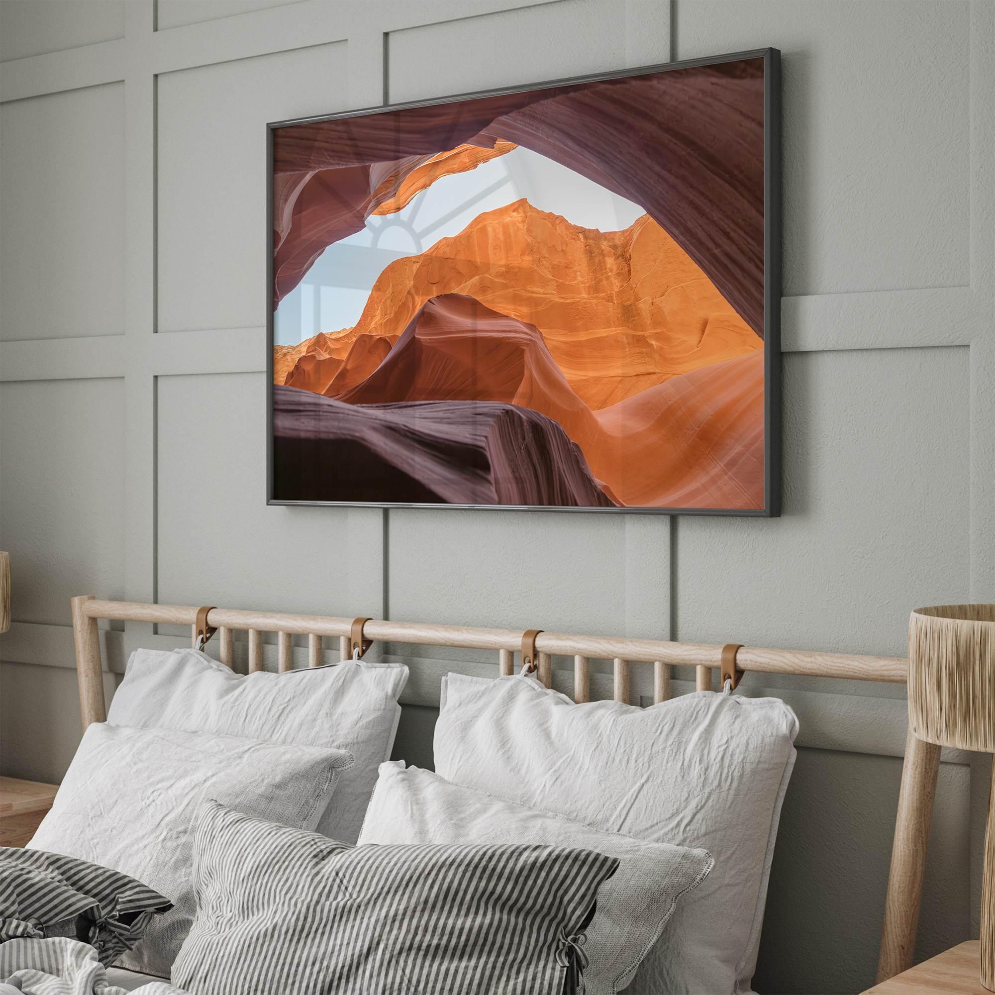 Framed fine art print of Antelope Canyon in Arizona, showcasing layered desert rock formations with rich colors and smooth textures.