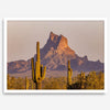 Framed photography print of an Arizona desert landscape with saguaro cacti and a sunlit mountain.