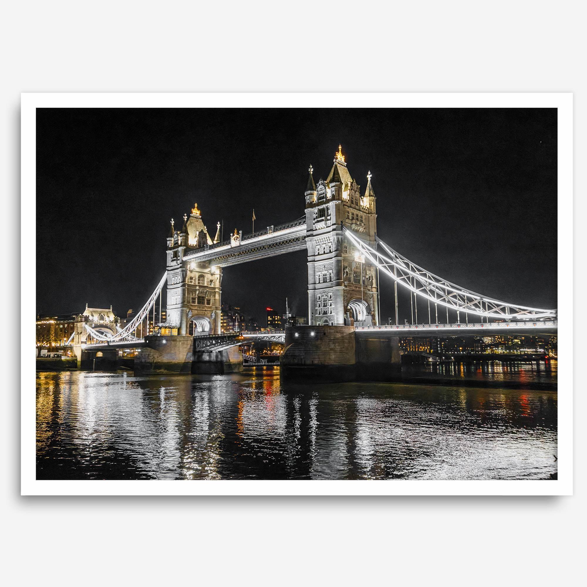 Night view of London’s Tower Bridge with glowing lights and water reflections, perfect london wall art print
