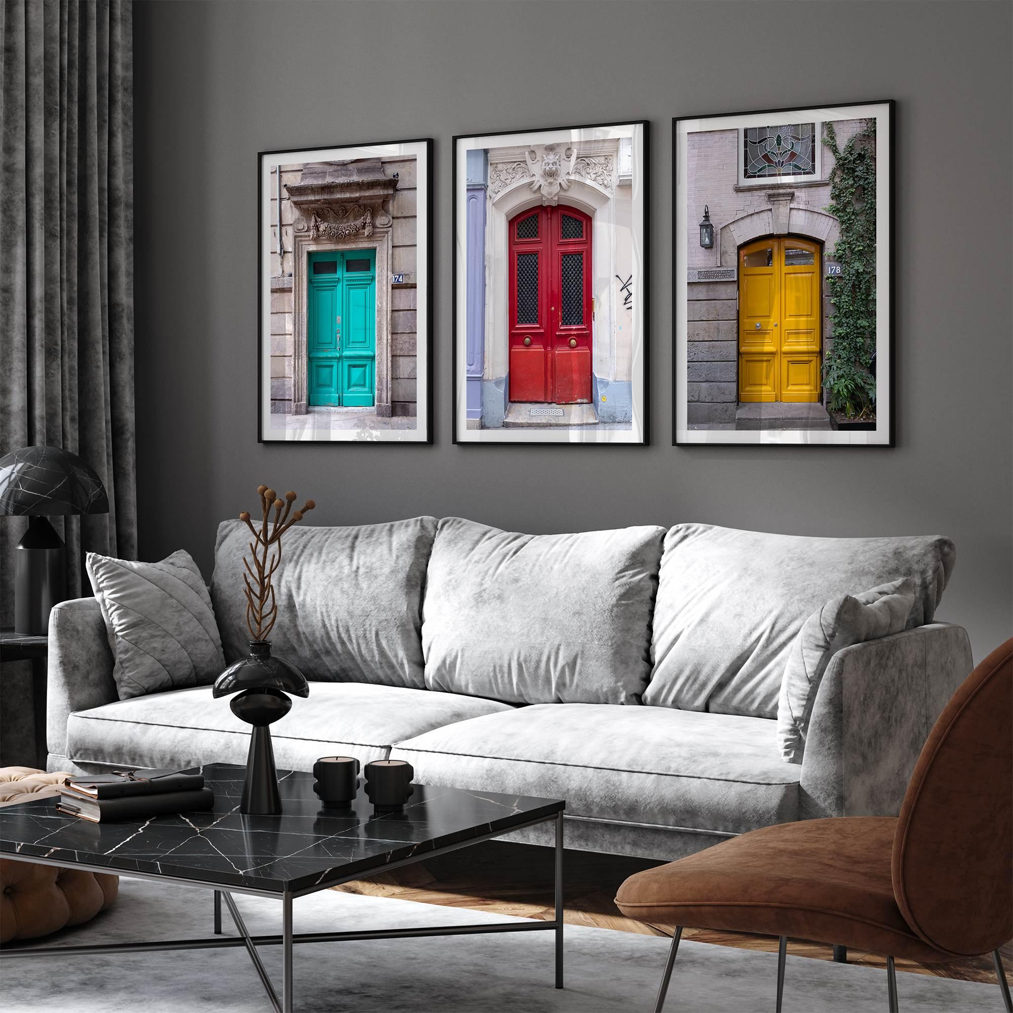Colorful three piece wall art featuring bold architectural doors in red, teal, and yellow tones.