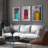 Colorful three piece wall art featuring bold architectural doors in red, teal, and yellow tones.