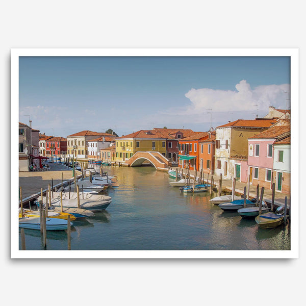 Colorful Murano Venice wall art featuring boats, bridge, and painted homes along the water.
