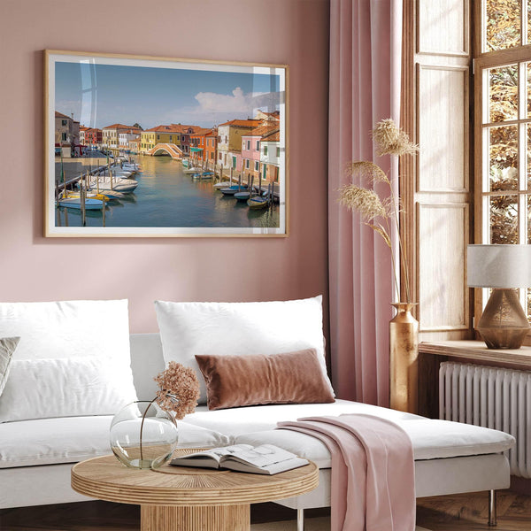 Colorful Murano Venice wall art featuring boats, bridge, and painted homes along the water.