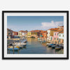Colorful Murano Venice wall art featuring boats, bridge, and painted homes along the water.