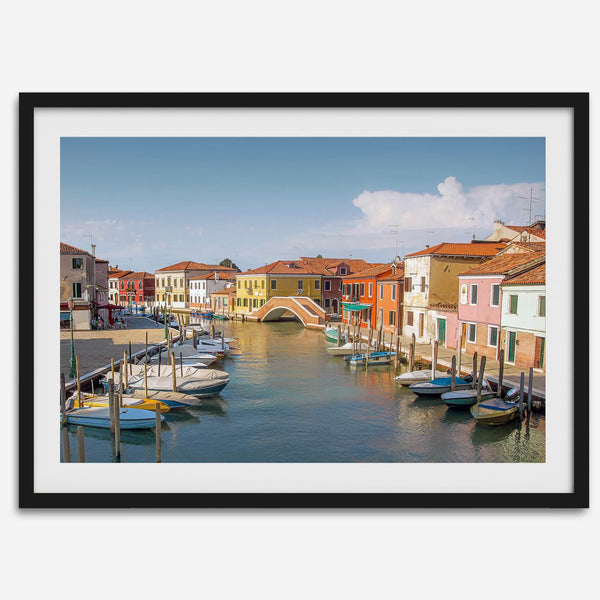 Colorful Murano Venice wall art featuring boats, bridge, and painted homes along the water.