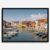 Colorful Murano Venice wall art featuring boats, bridge, and painted homes along the water.