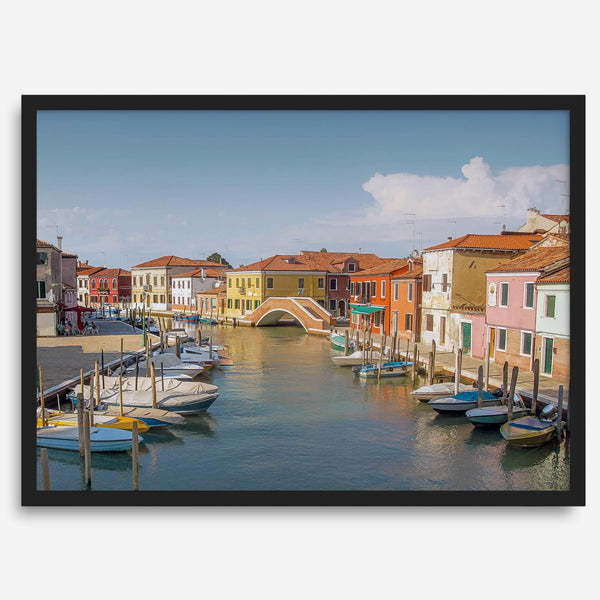Colorful Murano Venice wall art featuring boats, bridge, and painted homes along the water.