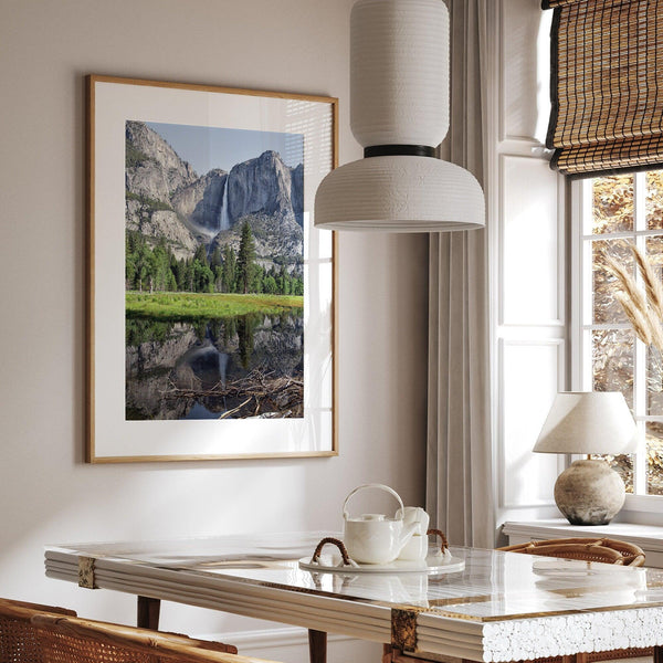 A stunning fine art print of Yosemite Falls with a reflection from Cook Meadows in Yosemite National Park.