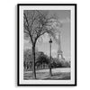 A wall art set of 2 prints from Paris. Left print - Eiffel Tower from Jardin de la Tour Eiffel. Right print - couple sitting in front of the fountain in Palais Royal Garden.