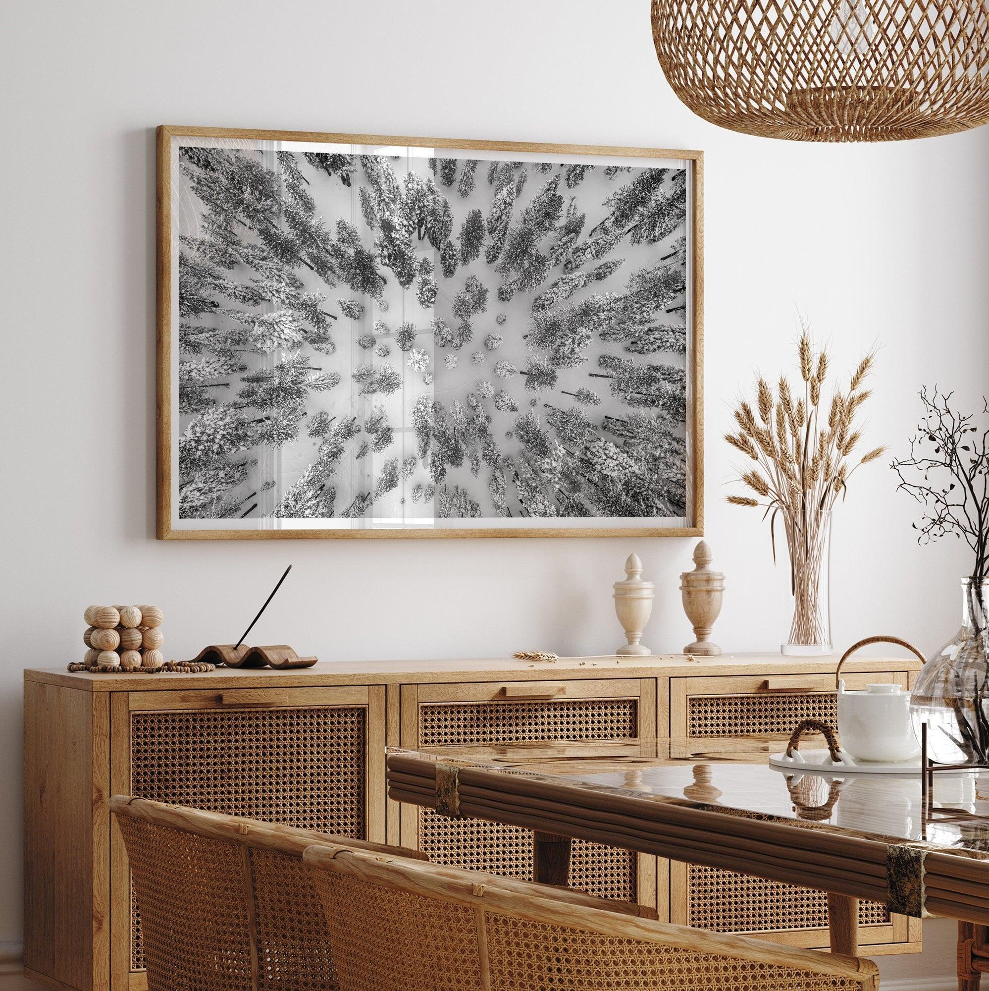 Snowy forest wall art with aerial photography of snow-covered trees in winter.