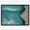 Aerial photo of Pismo Pier with surfers and turquoise ocean waves, ideal for coastal wall decor.