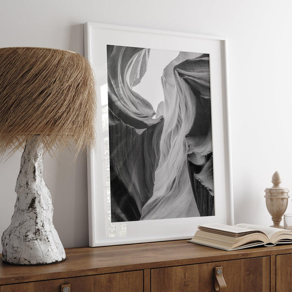 Black and white Antelope Canyon wall art showcasing deep shadows and intricate rock formations in Arizona’s iconic slot canyon.