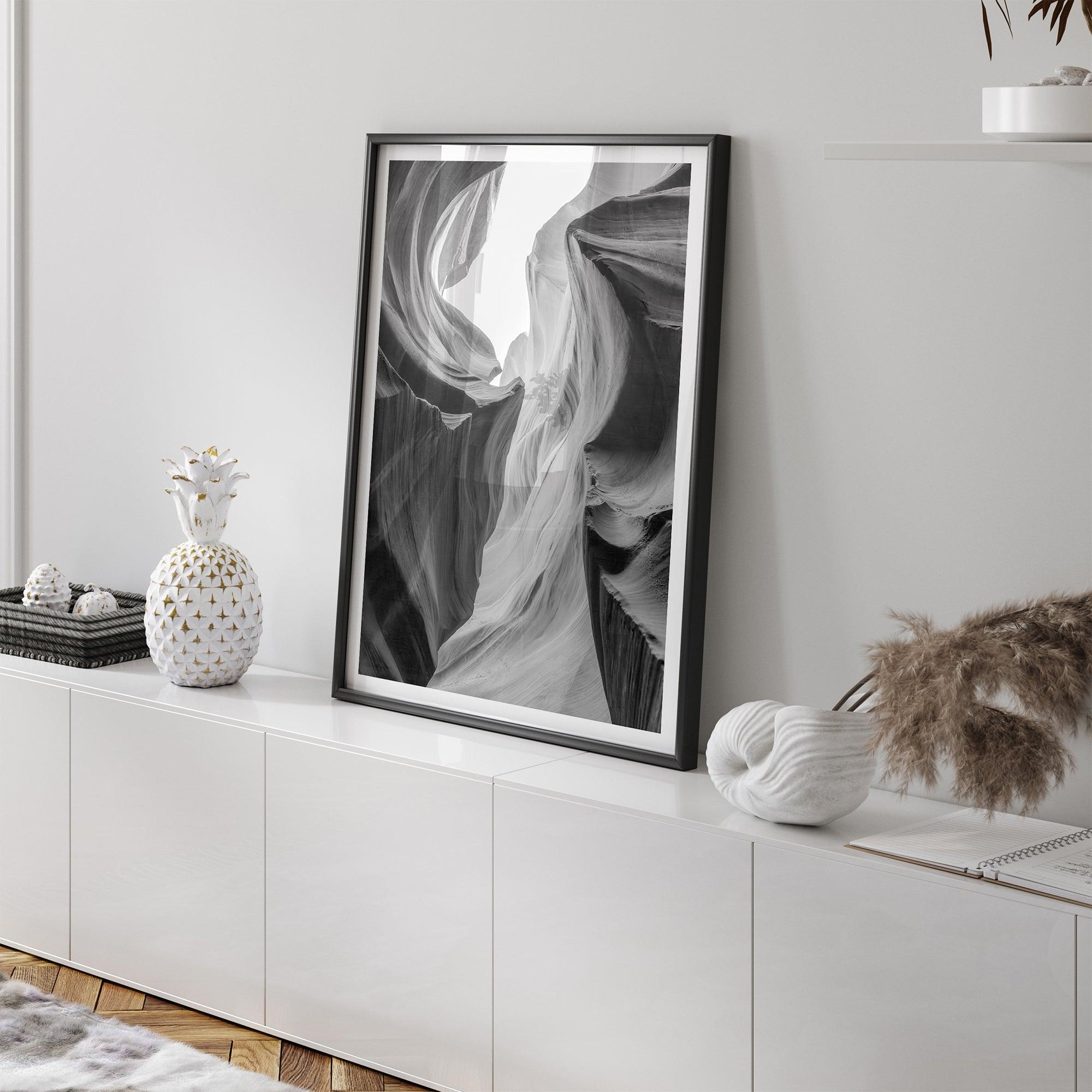 Black and white Antelope Canyon wall art showcasing deep shadows and intricate rock formations in Arizona’s iconic slot canyon.