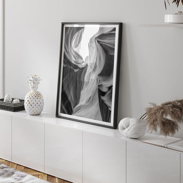 Black and white Antelope Canyon wall art showcasing deep shadows and intricate rock formations in Arizona’s iconic slot canyon.