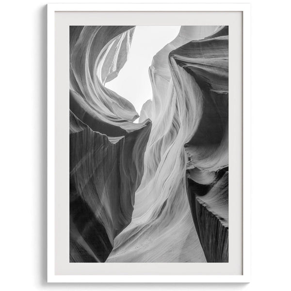 Black and white Antelope Canyon wall art showcasing deep shadows and intricate rock formations in Arizona’s iconic slot canyon.