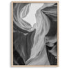 Black and white Antelope Canyon wall art showcasing deep shadows and intricate rock formations in Arizona’s iconic slot canyon.