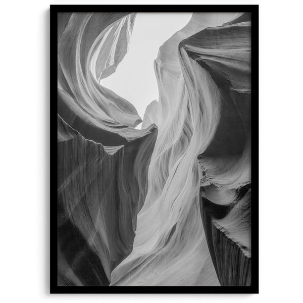 Black and white Antelope Canyon wall art showcasing deep shadows and intricate rock formations in Arizona’s iconic slot canyon.