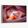 Vivid Antelope Canyon canvas featuring glowing sandstone curves in warm orange, red, and purple hues with sunlight streaming through.