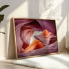 Vivid Antelope Canyon canvas featuring glowing sandstone curves in warm orange, red, and purple hues with sunlight streaming through.