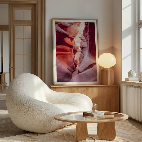 This beautiful Arizona desert wall art captures the mesmerizing beauty of Antelope Canyon. The picture showcases a passage through the rock in the canyon, with vibrant pink and purple textures that create a sense of depth and dimension.